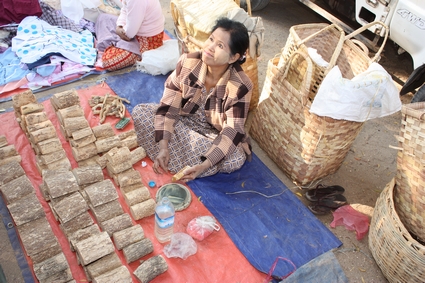 Woman selling Thanakha logs